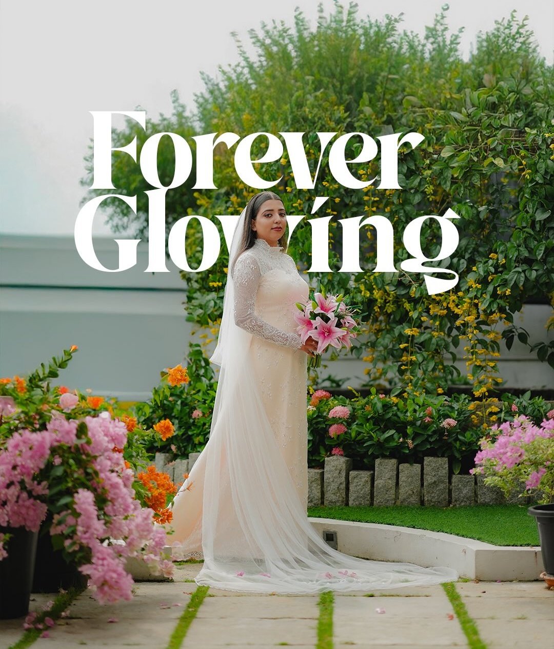 Bride and groom standing together beneath garden lights